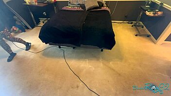 brunette milf housewife vacuums bedroom corners meticulously long hair swaying