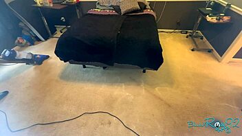 brunette milf housewife vacuums bedroom corners meticulously long hair swaying