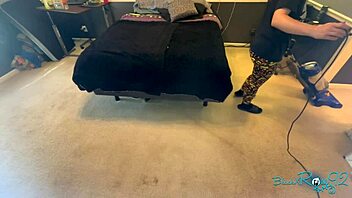 brunette milf housewife vacuums bedroom corners meticulously long hair swaying