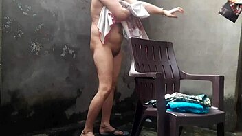 Wife bathes relaxed in sunny outdoor garden yard