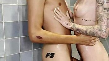 petite girl enjoys steamy shower play