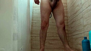 Guy jerks off passionately while showering at home