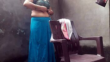 Wife bathes relaxed in sunny outdoor garden yard