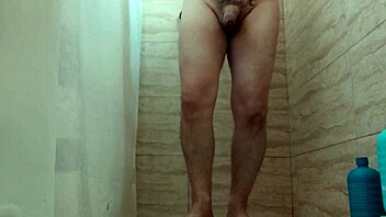 Guy jerks off passionately while showering at home