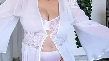 busty granny dances seductively in sexy lingerie