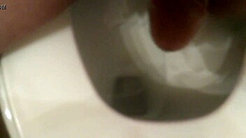 guy grips throbbing cock jerks off wildly to cum explosion