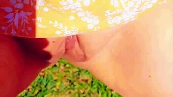 MATURE BLONDE SPREADS HUGE WET SHAVED PUSSY LIPS OUTDOOR FLASHING UPKIRT