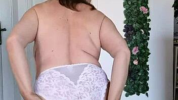 busty granny dances seductively in sexy lingerie