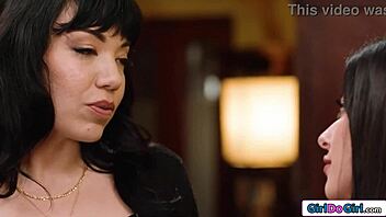 Petite brunette sneaks licks on her big tit latina milf boss's pussy