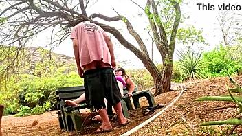 a steamy blowjob unfolds in the lush botanical garden