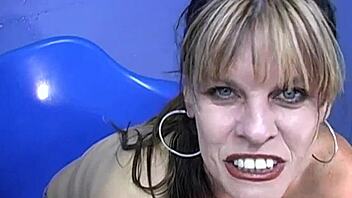 Busty cougar Anjelica devours BBC at gloryhole like a pro