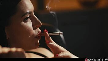 Brunette smokes cigarette fingering tight pussy in lingerie!