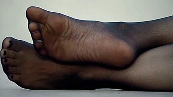 wife's sexy feet in nylon pantyhose tease