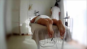 asian masseuse delivers oiled handjob happy ending