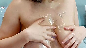 oiled titjob ends with sloppy cum on huge natural boobs