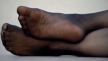 wife's sexy feet in nylon pantyhose tease