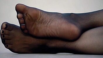 wife's sexy feet in nylon pantyhose tease