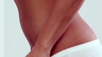 big tits blonde poses in lingerie striptease