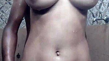 Desi Girl Strips and Bathes Guy in Homemade Close-Up
