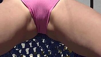 blonde rubs suncream on natural tits public beach flashing