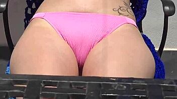 blonde rubs suncream on natural tits public beach flashing