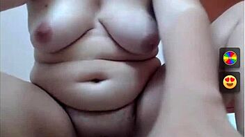 chubby milf fingers her fat natural tits eagerly