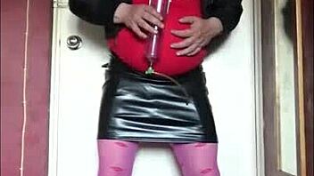 shy bisexual crossdresser in stockings shows pussy and cock