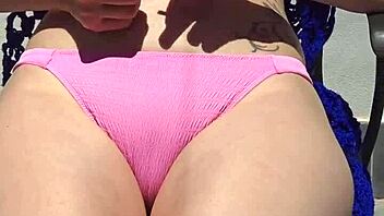 blonde rubs suncream on natural tits public beach flashing