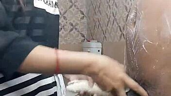 Desi Girl Strips and Bathes Guy in Homemade Close-Up