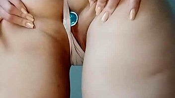 shaved wet pussy flashes with buttplug teasing ass hole