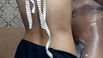 Desi Girl Strips and Bathes Guy in Homemade Close-Up
