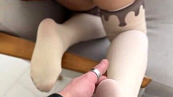 cute curly blonde nerd plays submissive foot fetish in nylons and socks