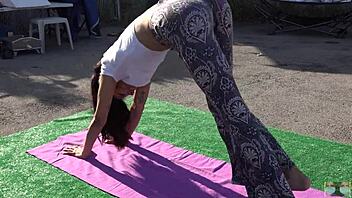 sexy asian filipina teen stretches yoga pants in public outdoor workout