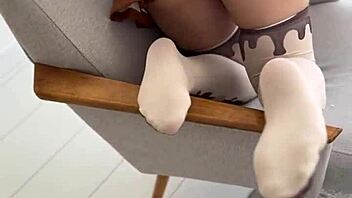 cute curly blonde nerd plays submissive foot fetish in nylons and socks