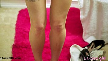 beautiful brunette effortlessly enjoys her relaxing shower moment