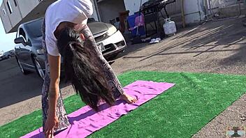 sexy asian filipina teen stretches yoga pants in public outdoor workout