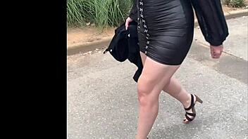 my wife struts in mini leather dress and sexy heels