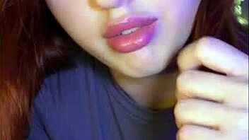 a blue-eyed redhead babe rides dildo passionately, faking tits bouncing with cum play and joi