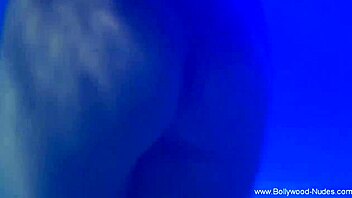 seductive asian brunette dances nude teasing her curves