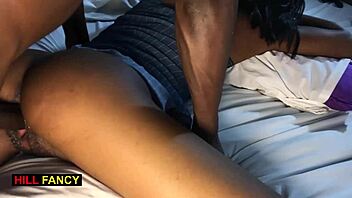 Sweet black student rides huge cock bareback in bed
