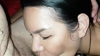 Sexy Thai babe sucks hard cock with tight lips