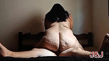 Tattooed chubby Brazilian femdom rides bull on bed