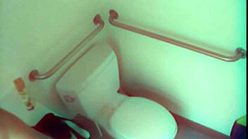 horny slut spies then toys pussy hard in public toilet stall