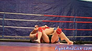 Lesbian wrestlers lick wet pussies passionately