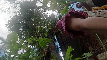 check out her upskirt panties while pruning