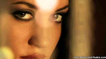 Brunette slips into her sleek BLACK DRESS elegantly