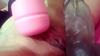 Masturbating big swollen pussy with fat dildo massager