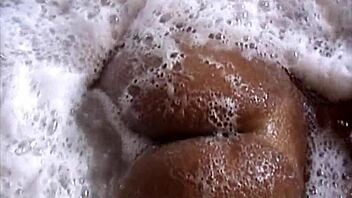 Wow, naughty brunette flashes ass at bar and tub!