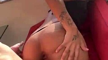 A Brazilian couple fucks bareback at the window for neighbors