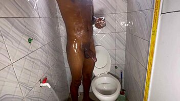 big black cock throbs under shower water getting soapy